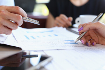 Group of people discuss plan at workplace closeup top view. Training course, mediation offer, university practice homework, school or college exercise, secretary job, desk talk, pad, arm concept