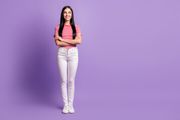 Full body photo of charming brunette woman folded hands stand copyspace happy isolated on violet color background