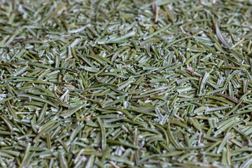 Dried rosemary leaves (Rosmarinus officinalis). A seasoning for cooking and a medicinal plant used in medicine.