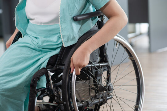 Close up of disabled girl on the whellchair