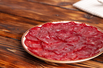 Delicious meat slicing on plate close up