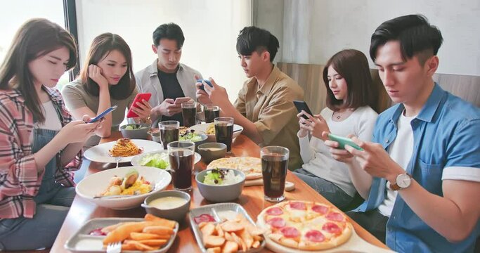 phubbing concept in dine together