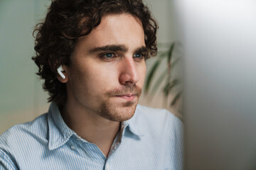 Fototapeta premium Confident young serious man entrepreneur