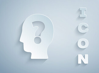 Paper cut Human head with question mark icon isolated on grey background. Paper art style. Vector.
