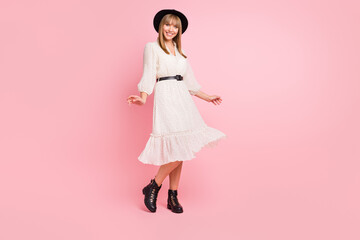 Full length photo of lady dance have fun wear retro cap dotted dress footwear isolated pink color...