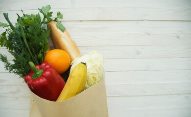 Diet plan notebook and vegetables with copy space for healthy food concept