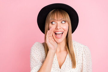 Photo of curious lady palm open mouth look empty space wear retro headwear dotted blouse isolated pink color background