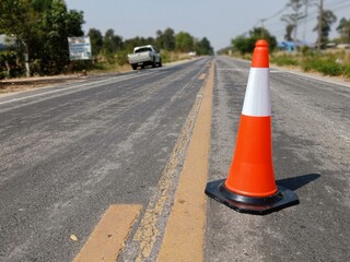 Road construction blur And the rubber cone is located in front