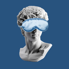 Gypsum statue of David head in blue sleep mask. Plaster copy of David's head in sleeping mask, ancient greek sculpture. Creative, sleep and relax concept. Minimal concept art. Last or blind judgment