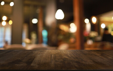 Wood Table Top in Blur Background room interior with empty copy space.