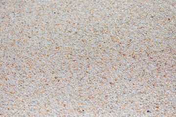 Texture of pebble stones red and black quartz floor - quartz sand texture