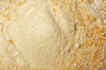 Bread crumbs texture background, top view