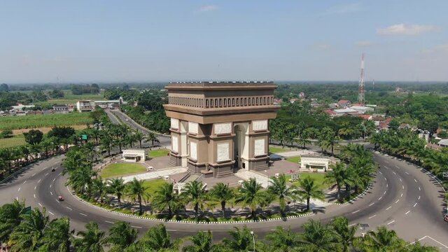 Simpang Lima Gumul Monument landmark of Kediri, Java, Indonesia. Aerial orbiting