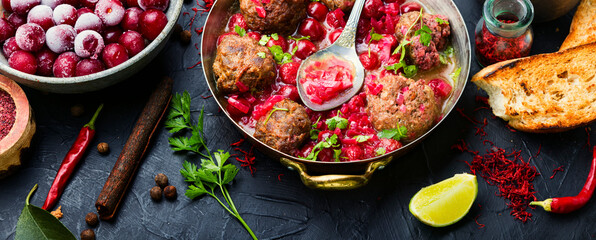 Lamb meatballs in cherry sauce