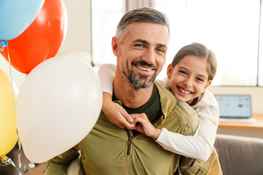 Happy military father and his daughter reunion