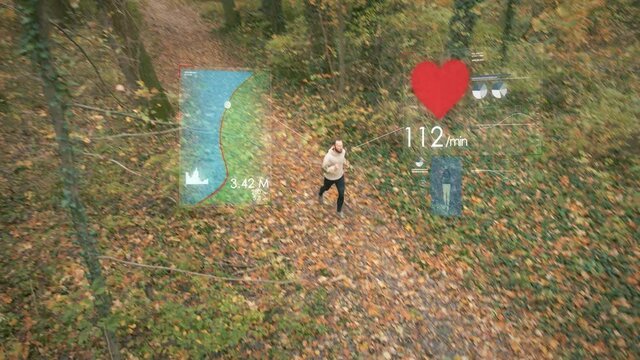 Man running alone in autumn forest with overlay health infographic. Aerial tracking