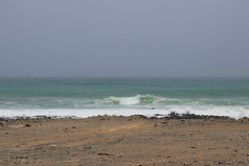 Beach in Oman, Masirah Island volcanic landscape