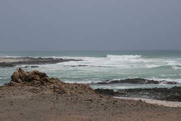 Beach in Oman, Masirah Island volcanic landscape