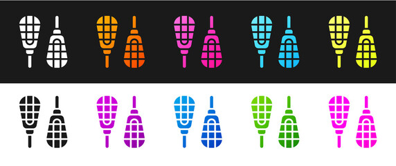 Set Snowshoes icon isolated on black and white background. Winter sports and outdoor activities equipment. Vector.