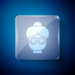 White Grandmother icon isolated on blue background. Square glass panels. Vector.