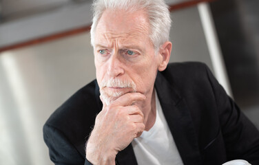 Portrait of thoughtful senior businessman