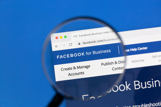 Ostersund, Sweden - Feb 4, 2021: Facebook business webpage under a magnifying glass. Facebook is the most visited social network in the world.