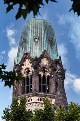Tower of the Kaiser Wilhelm Gedaechtniskirche at the center of Kurfuerstendamm in West Berlin, Germany