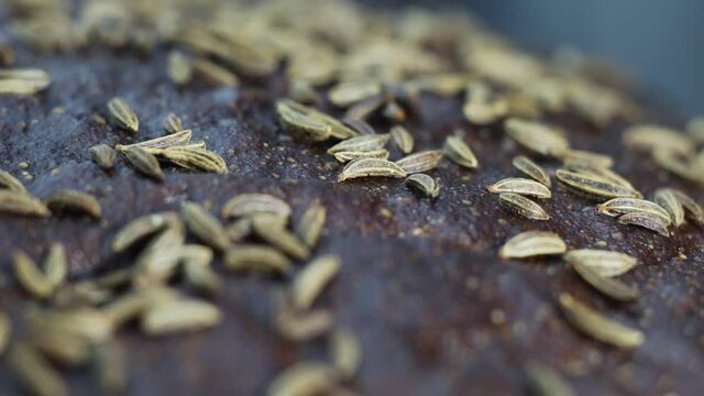 cumin spices on black bread