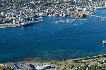 overview photo of the arctic circle city of Tromsoe in northern Norway in summer., mountain view