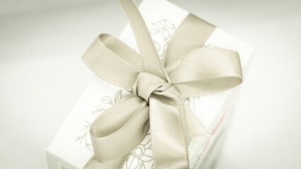 Grey gift box with grey bow for a fun holiday or birthday party