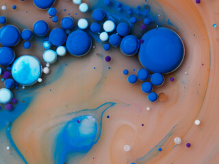 abstract background oil drops on water macro orange