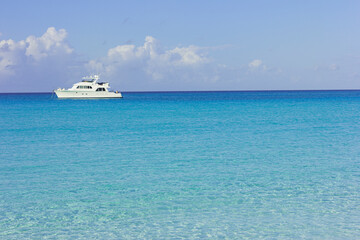 White yacht in the bright blue sea