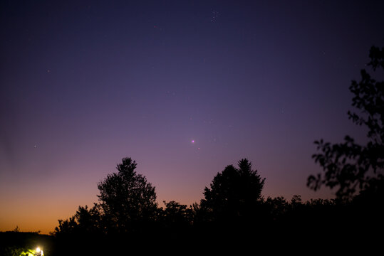 the constellations hyades and pleiades in the night sky with planet venus right in center of taurus
