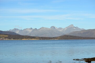 majestic mountain and fjord landscape in autumn sunlight in northern Norway