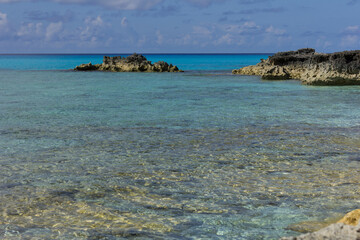 stones on the beach. blue water