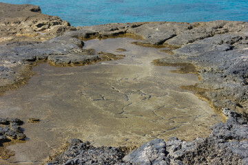 stones on the beach. blue water