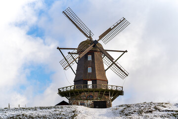 Dutch windmill in the country during winter 