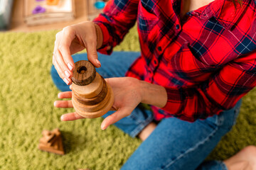 Three different pyramids made of natural wood for children. Beautiful toys that are safe for children's health.