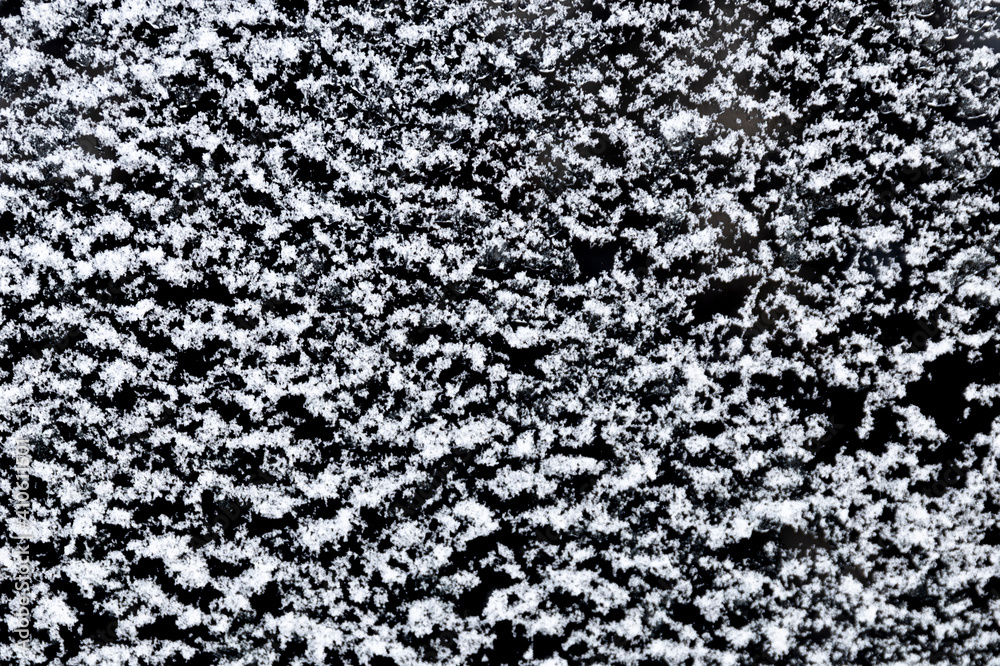 Poster white snow isolated on a black background. winter elements for design
