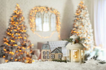 Composition with Christmas lantern in decorated room