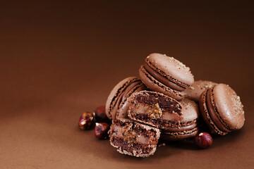 chocolate macarons with hazelnut praline ganache fiiling