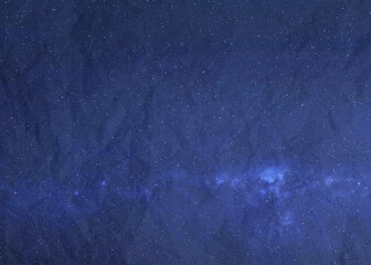 Starry night sky background with crumpled paper texture. Abstract space bacground. Milky way stars. Elements of this image were furnished by NASA.
