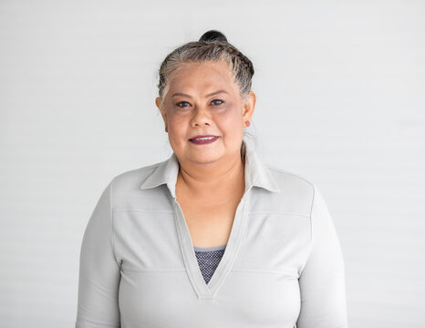 Portrait Of Senior Older Asian Woman With Tender Kindly Smile