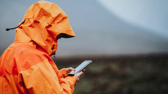 Orange raincoat in the rain