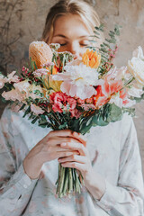 Blonde girl with flowers
