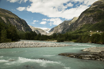 Wild river in front of Buarbreen Glacier, Norway