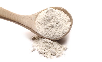 Rye flour pile with wooden spoon isolated on white background