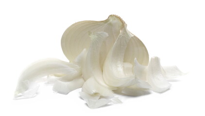 Sliced onion half and pieces pile isolated on white background