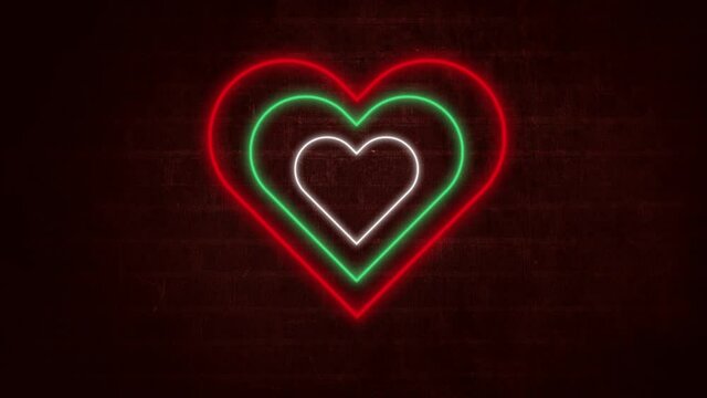 Animation of green white and red concentric neon hearts flashing on dark brick wall