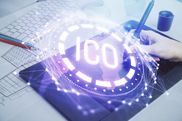 Double exposure of blockchain business sketch hologram and woman holding and using a mobile device.